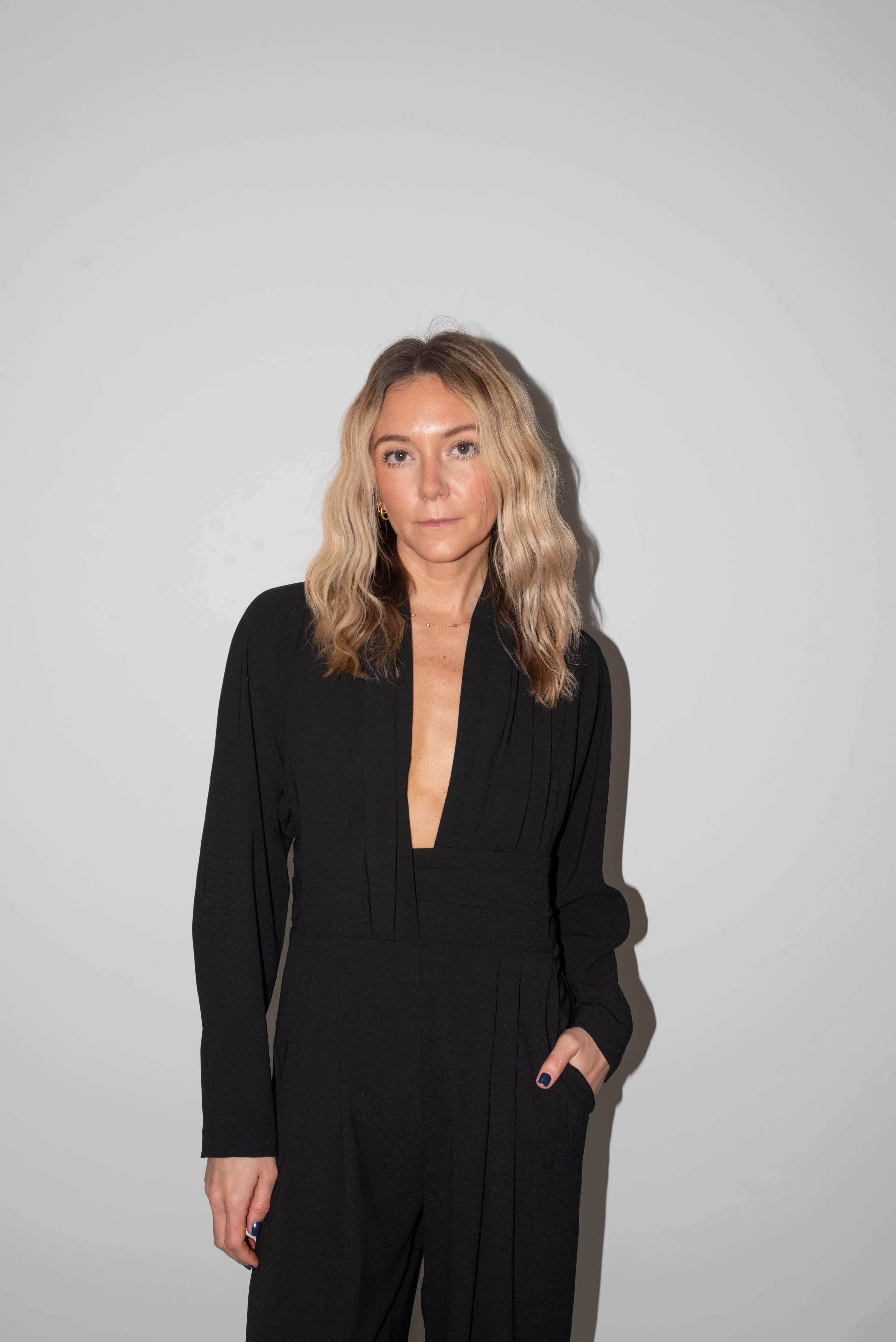 CINNIE DEEP NECKLINE JUMPSUIT