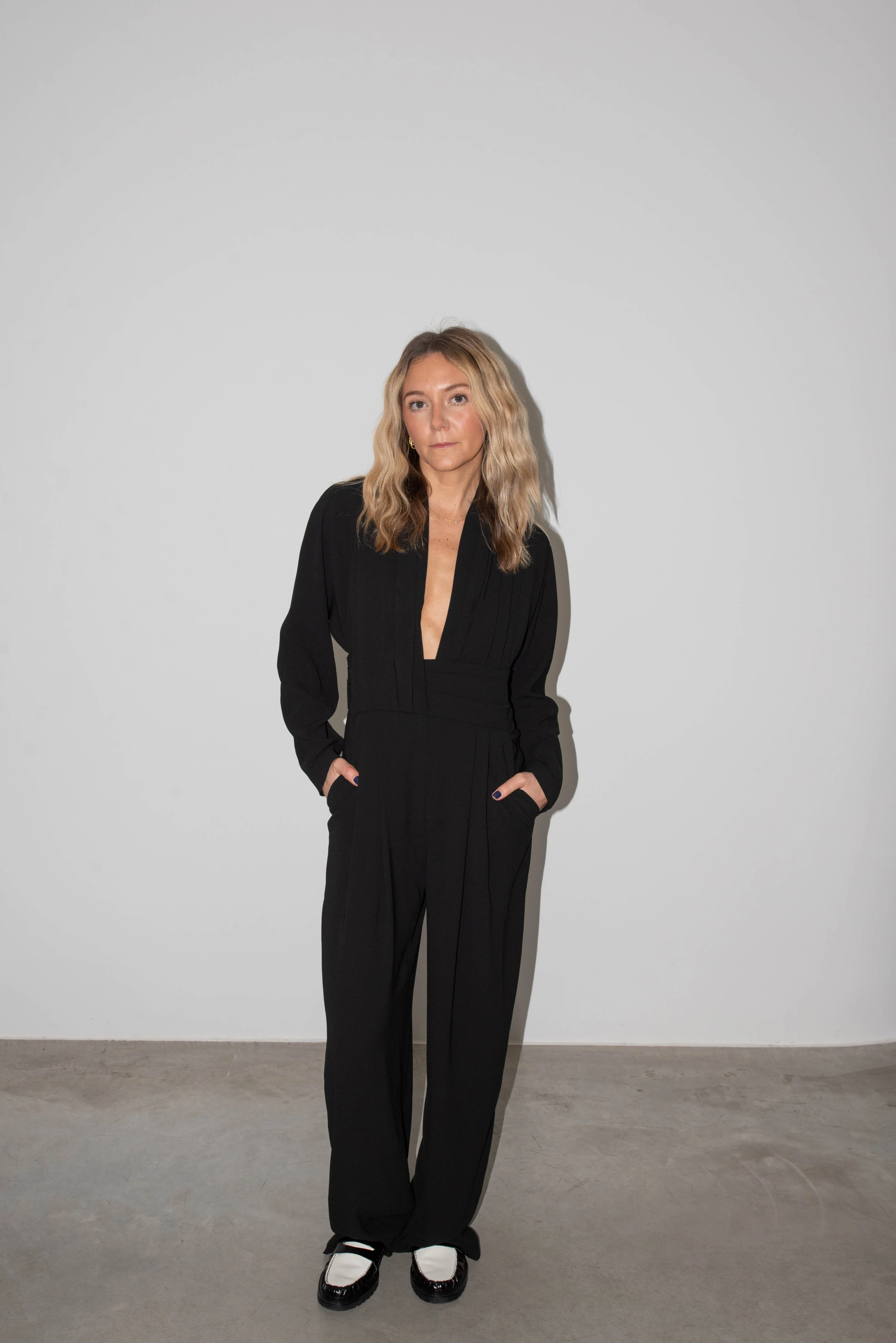 CINNIE DEEP NECKLINE JUMPSUIT