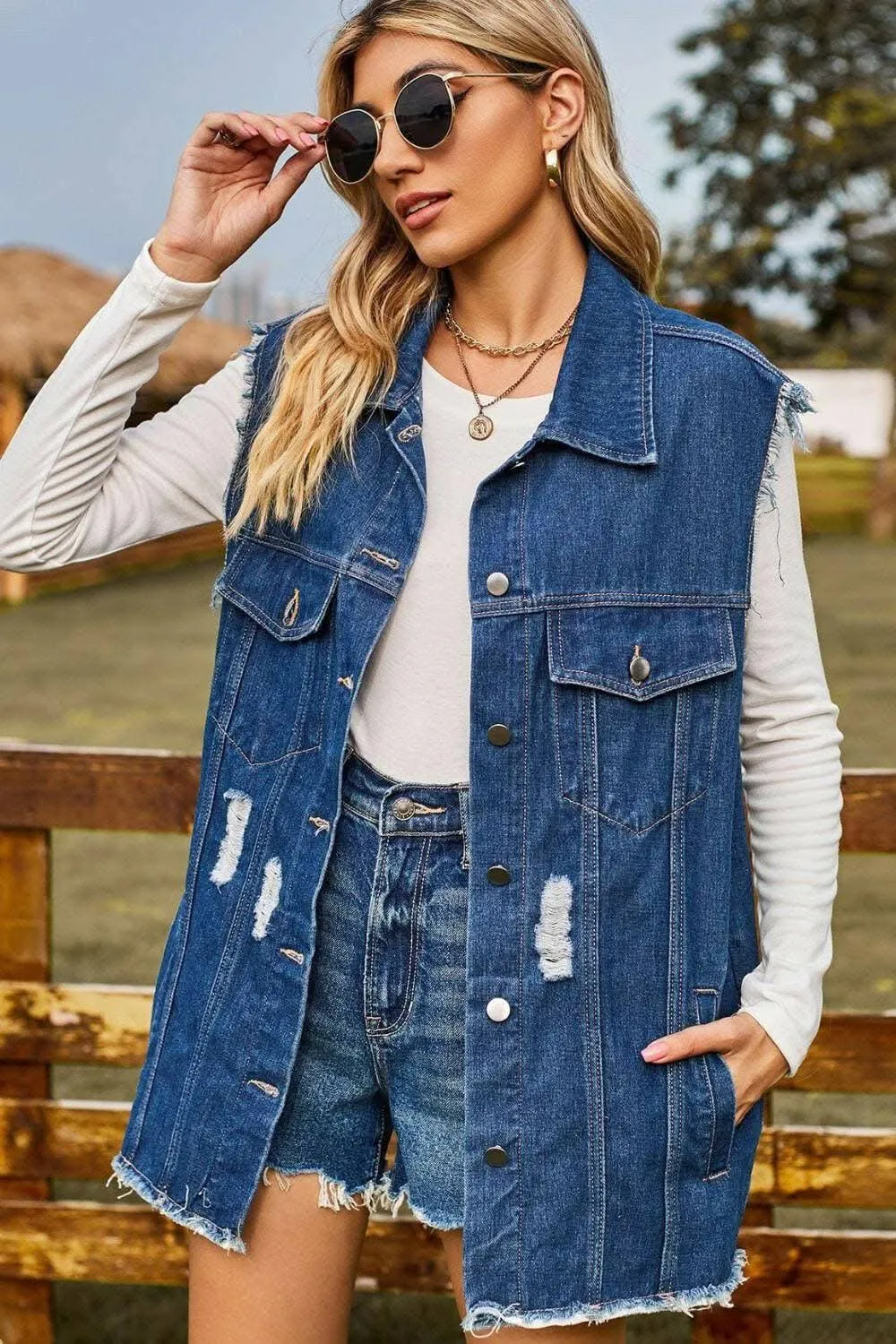 Stylish distressed denim sleeveless top